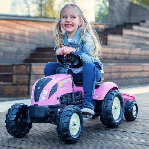 Rózsaszín pedálos traktor utánfutóval
