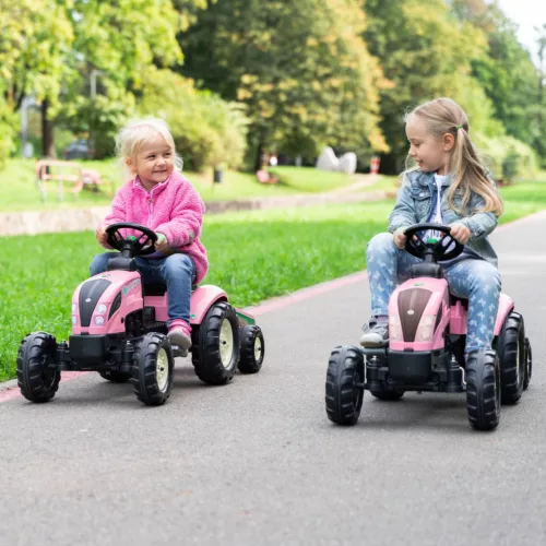 Rózsaszín pedálos traktor utánfutóval